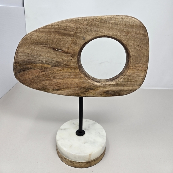 Mango Wood Carved Pedestal Modernist Abstract Mango Wood Free Form Cirucular Cutout On Mable Wood Stand